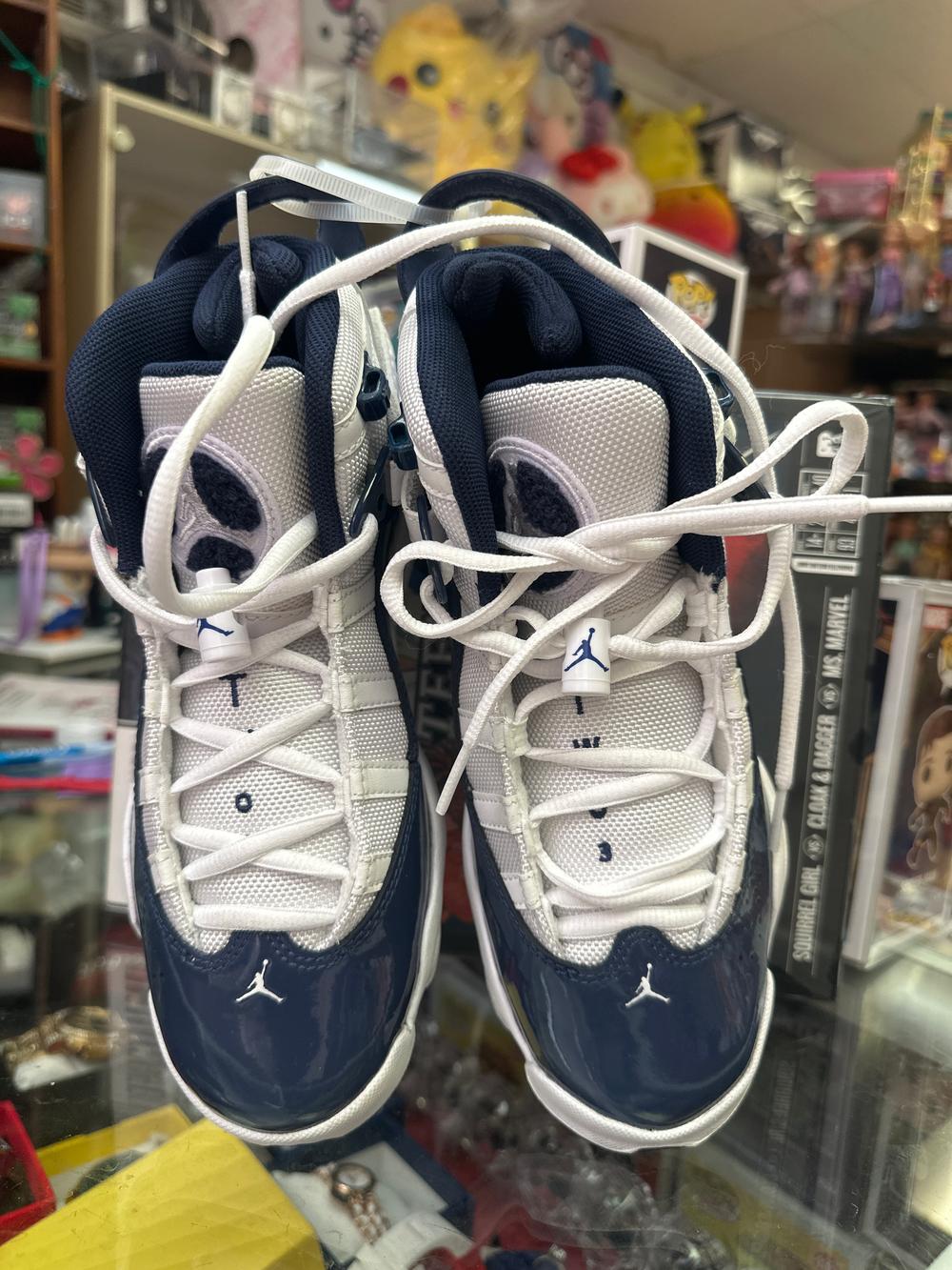 Air Jordan 11 Retro Navy And White Sneakers