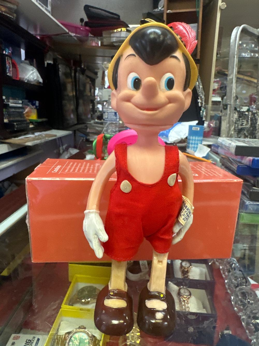 Vintage Pinocchio Vinyl Figure with Cloth Overalls