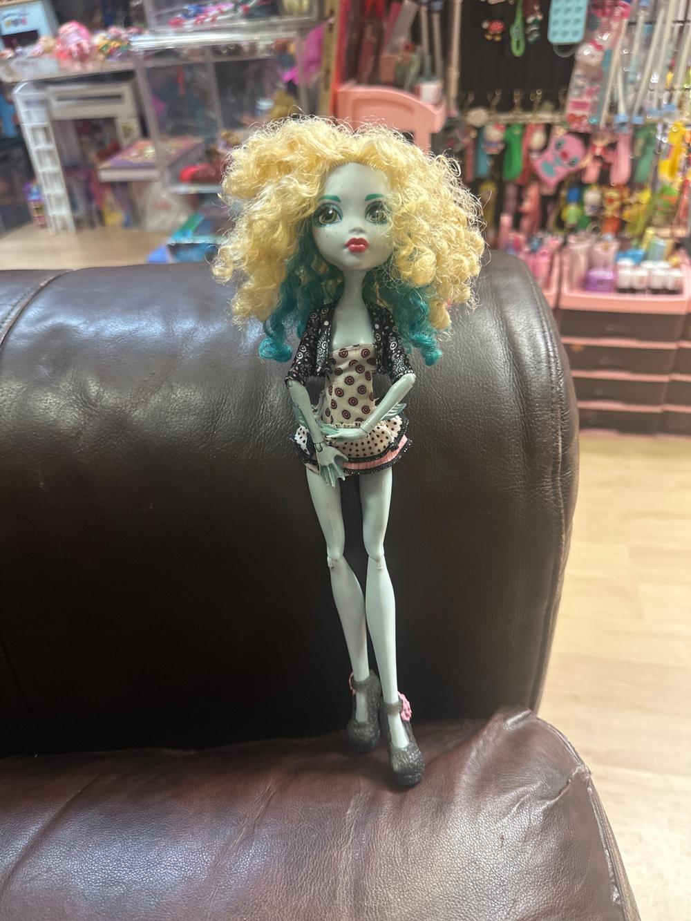 Curly Blonde Monster High Doll with Teal Tips