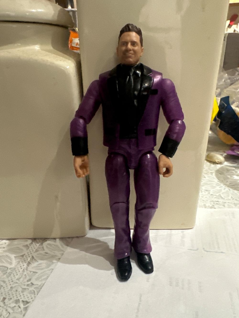WWE Wrestling Action Figure in Purple Suit