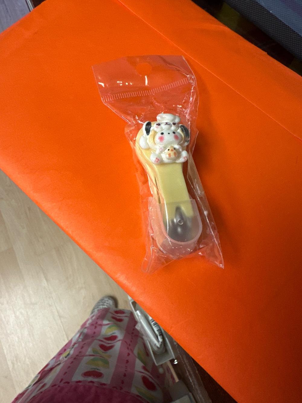 Sanrio Pochacco Nail Clipper Yellow Figural Handle (photo 1 of 3)