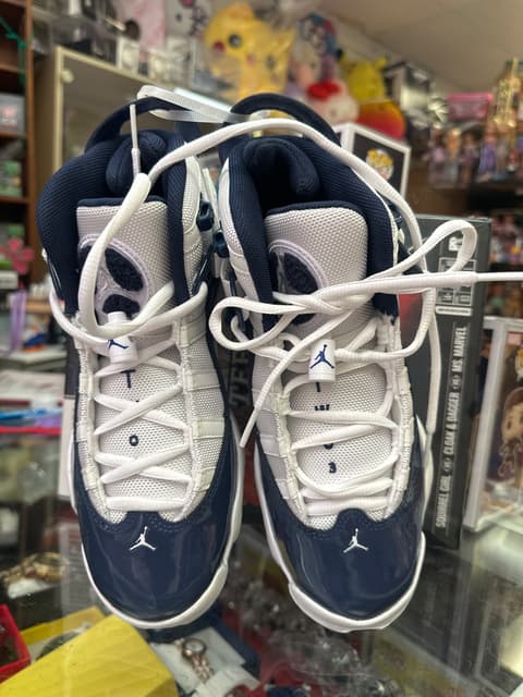 Air Jordan 11 Retro Navy And White Sneakers