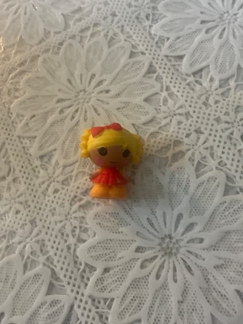Tiny Blonde Doll Figure With Red Bow