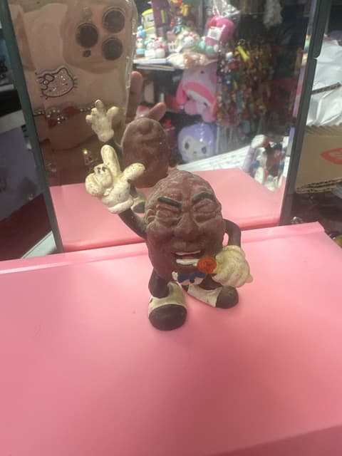 Peanut Character Figure With Peace Sign