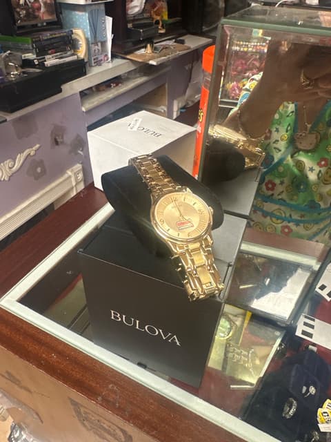 Gold-Tone Bulova Watch with Bimbo Bakeries Logo Dial