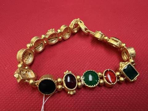 Golden Bracelet with different colored stones