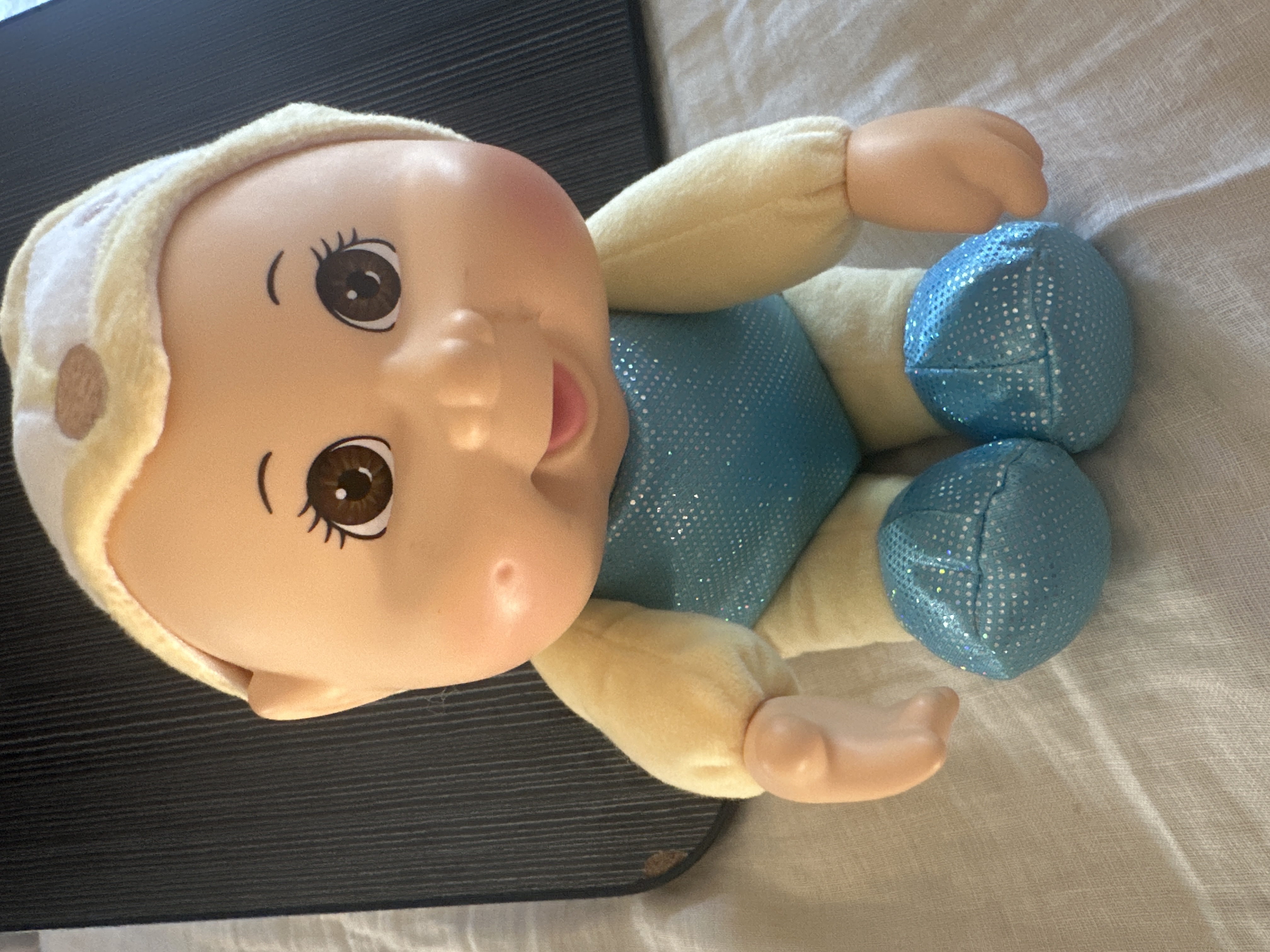Plush Baby Doll in Sparkly Blue Outfit