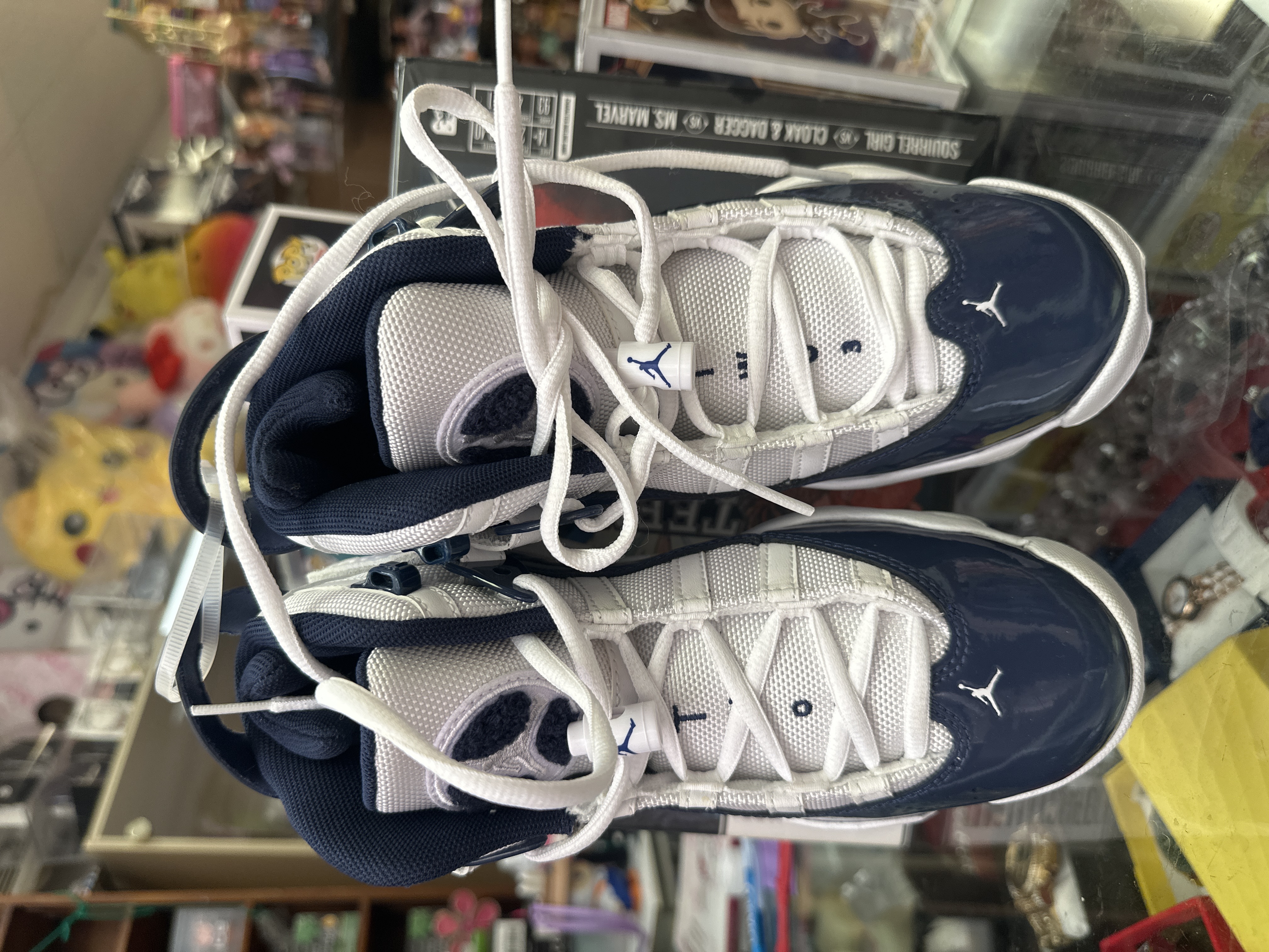 Air Jordan 11 Retro Navy And White Sneakers
