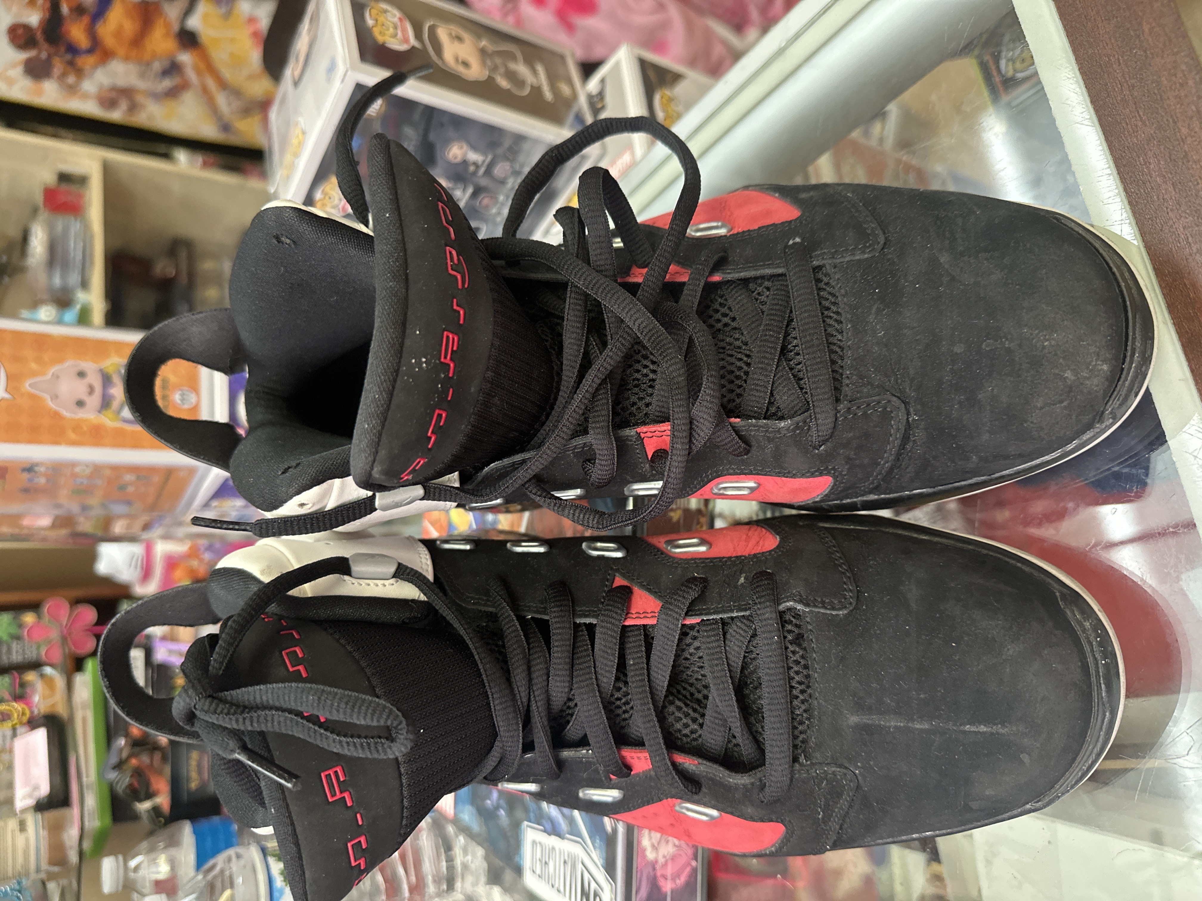 Black Suede High-Top Sneakers With Red Accents