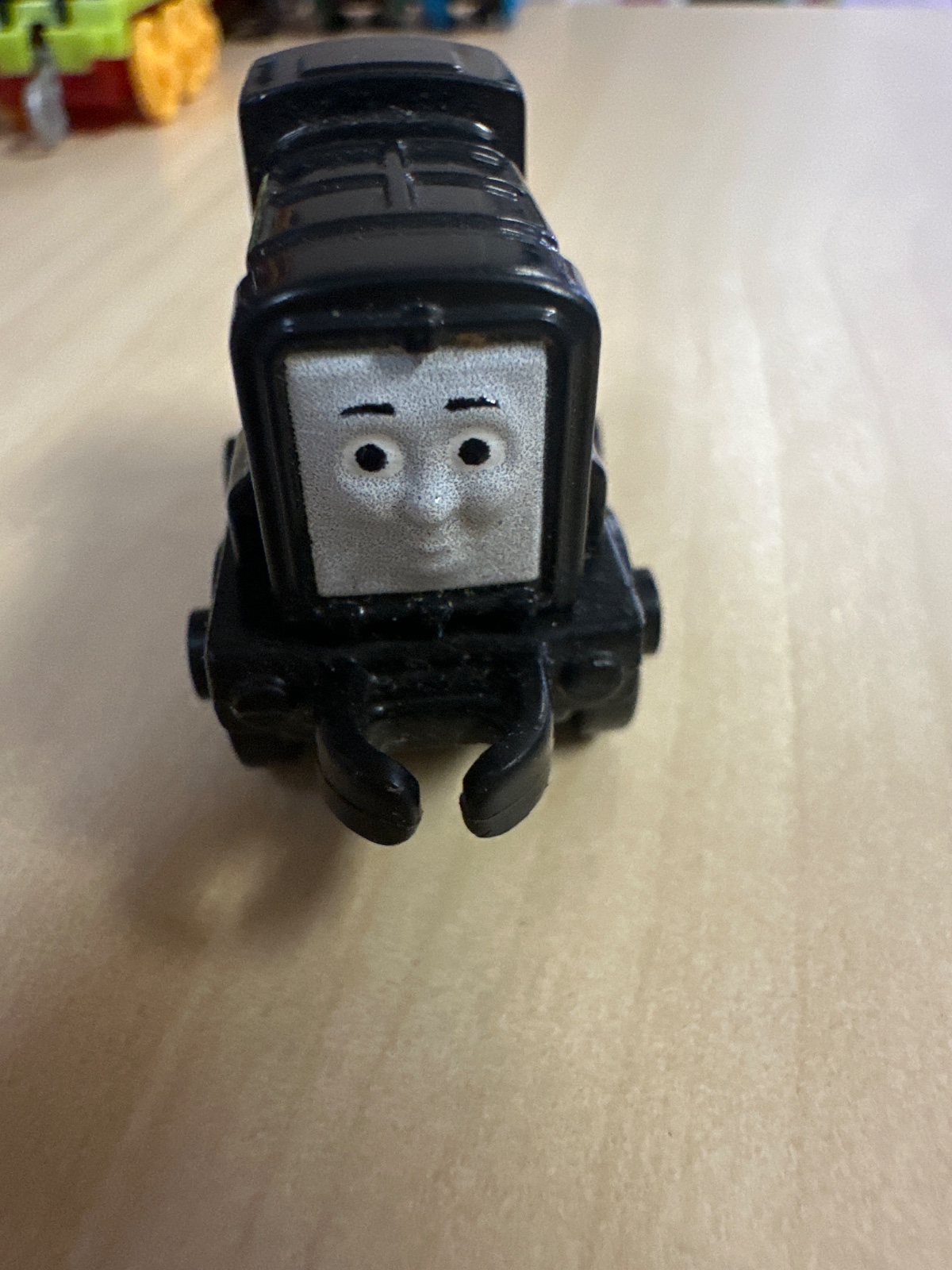 Black Toy Train Engine with Face