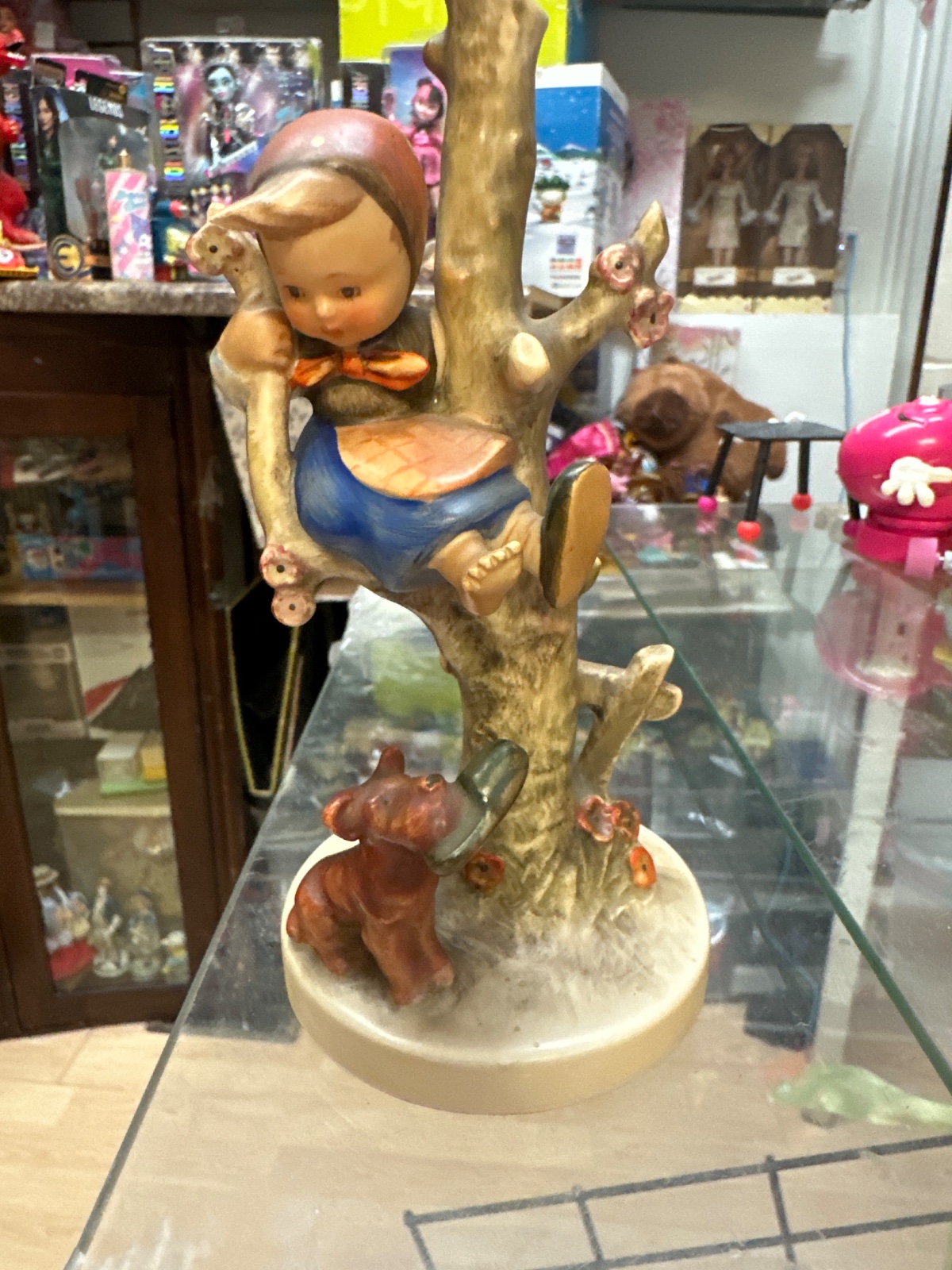 Boy Climbing Tree Figurine with Dog