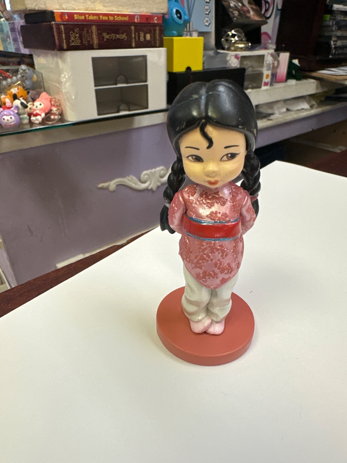 Braided Girl Figurine in Pink Robe