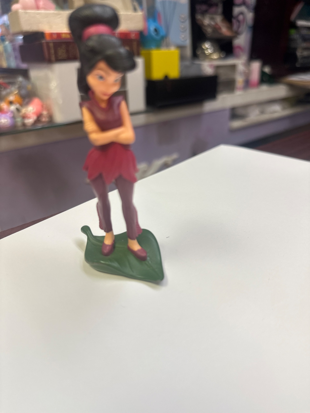 Fairy Figurine In Burgundy On Leaf Base