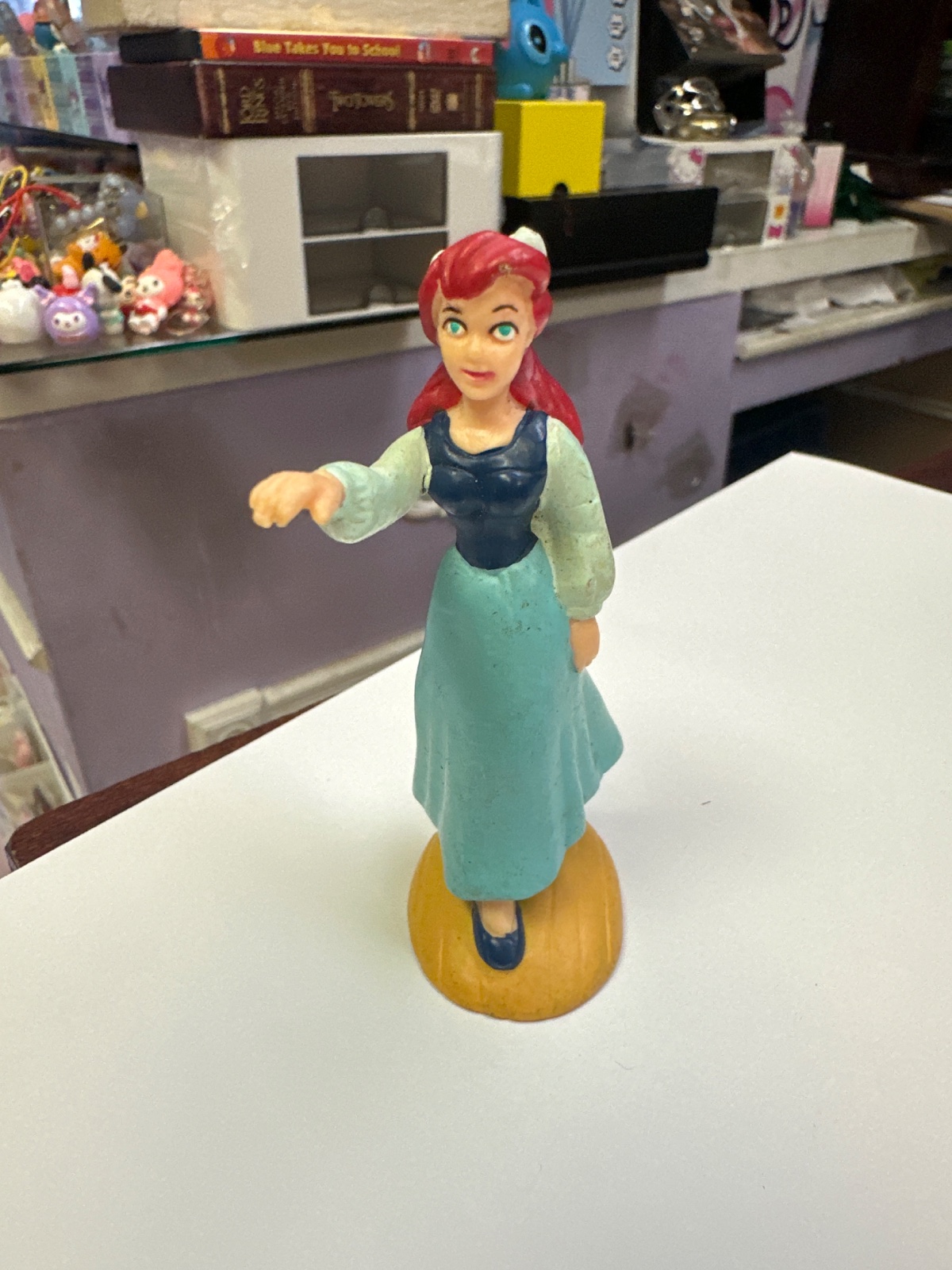 Red-Haired Princess Figurine in Teal Dress