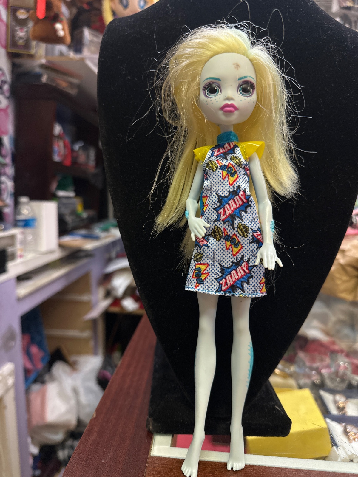Blonde Monster Doll in Comic Print Dress