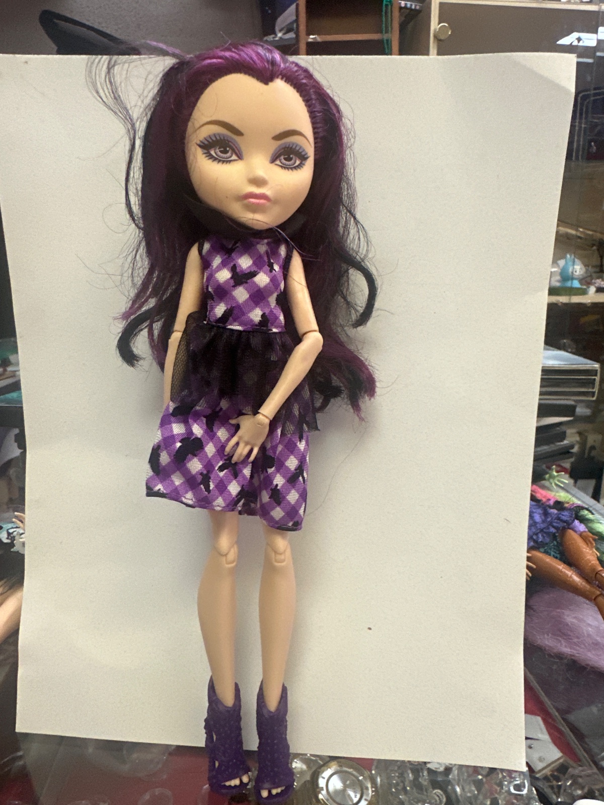Purple-Haired Fashion Doll in Bird-Print Dress