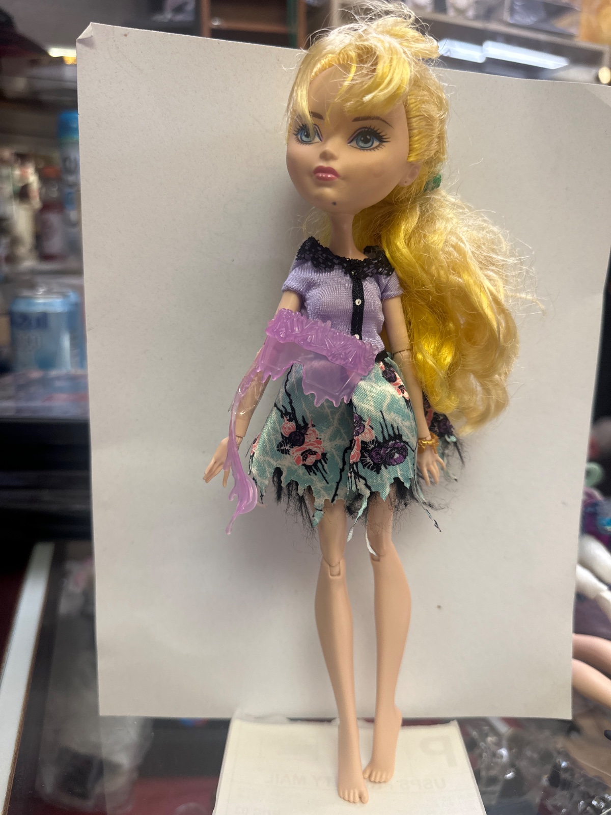 Blonde Fashion Doll with Floral Tattered Dress