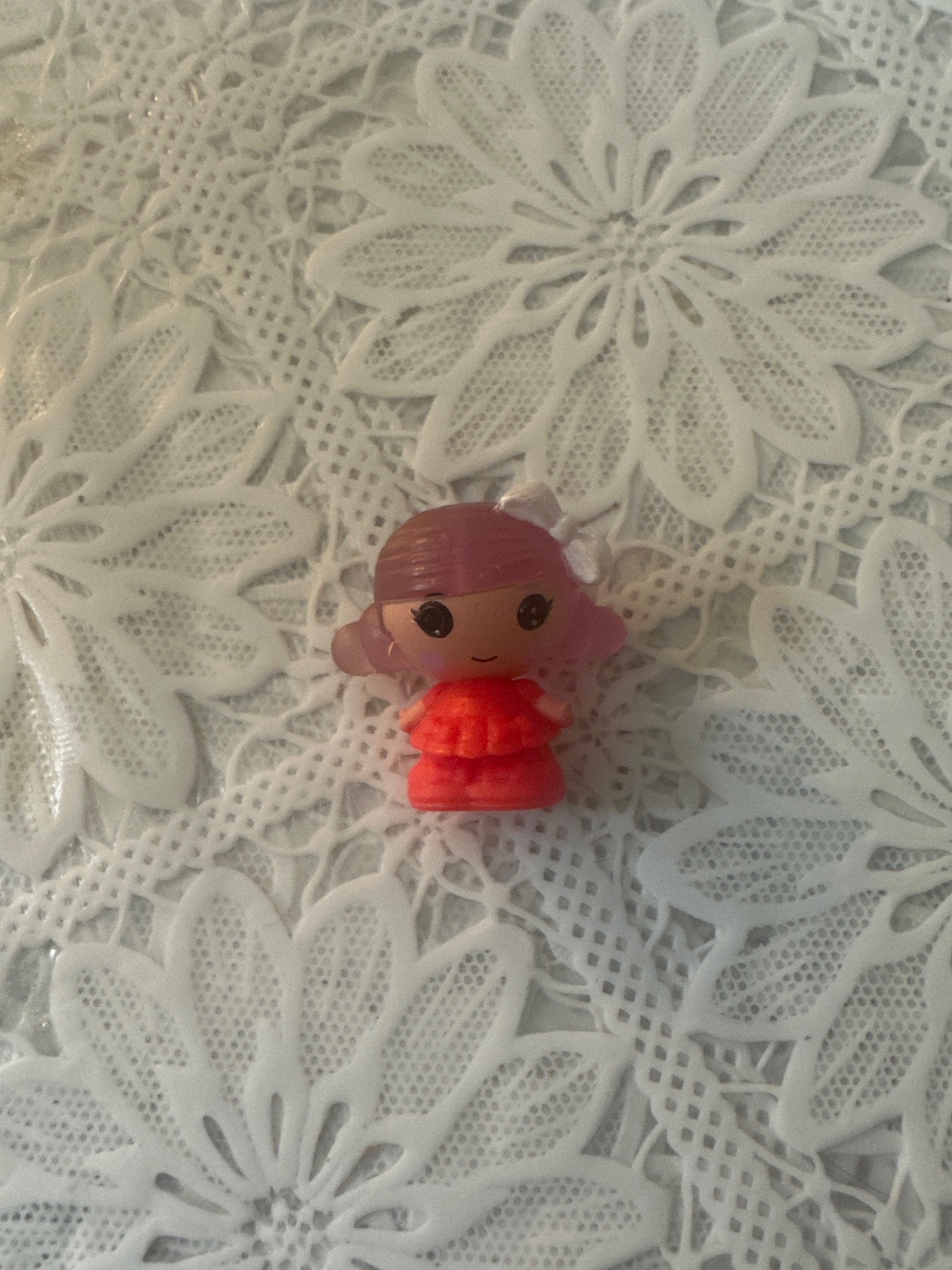 Tiny Girl Figure in Red Dress