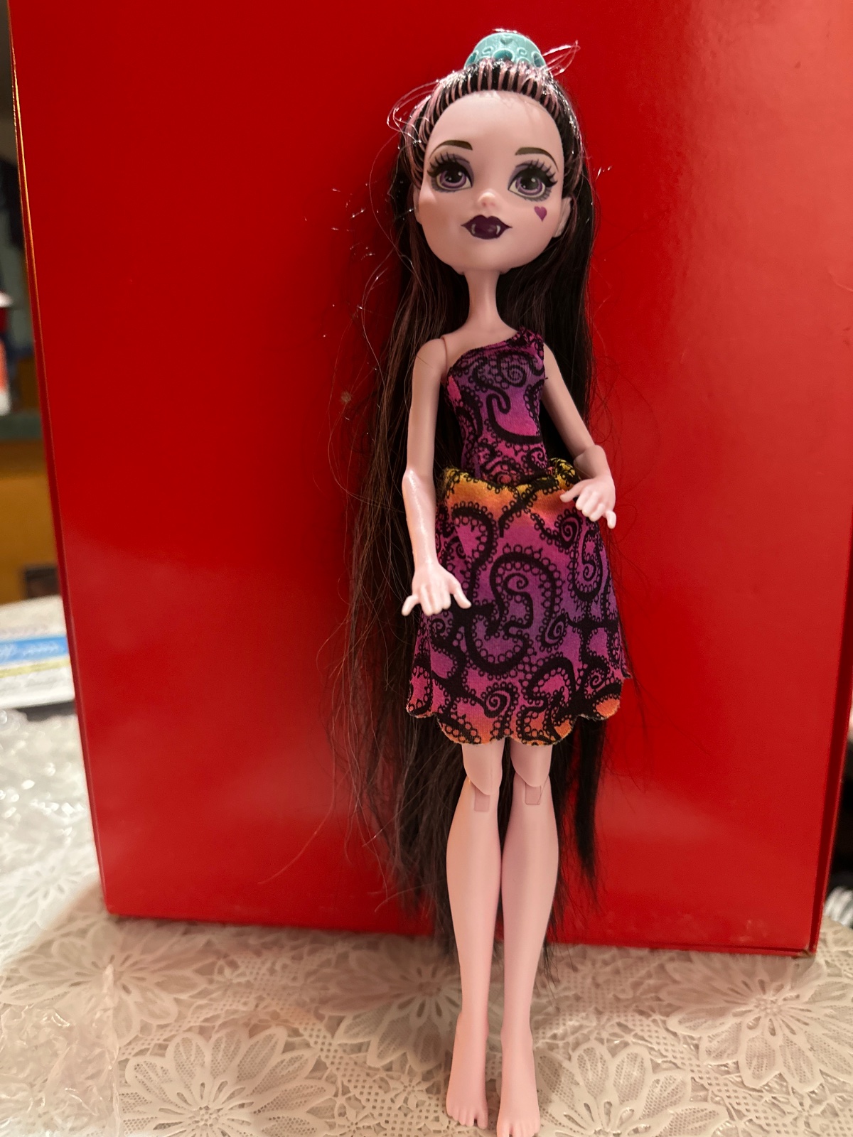 Long-Haired Fashion Doll With Purple Print Dress