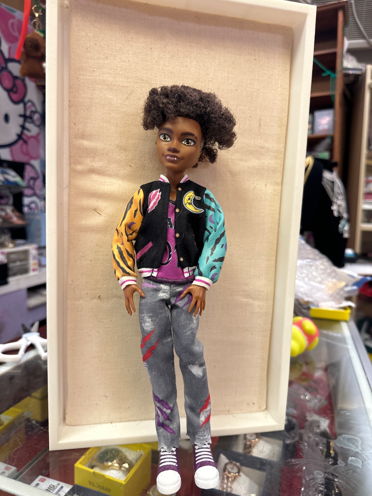 Curly-Haired Fashion Doll with Varsity Jacket