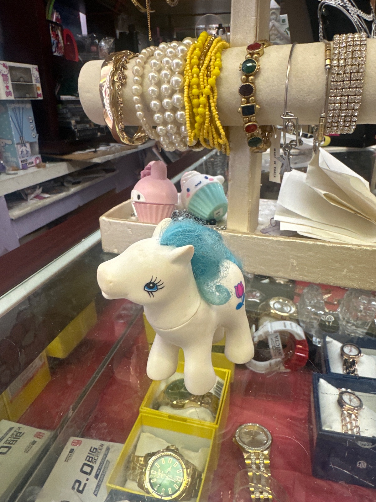 White Pony Figure with Blue Hair and Tulip Mark