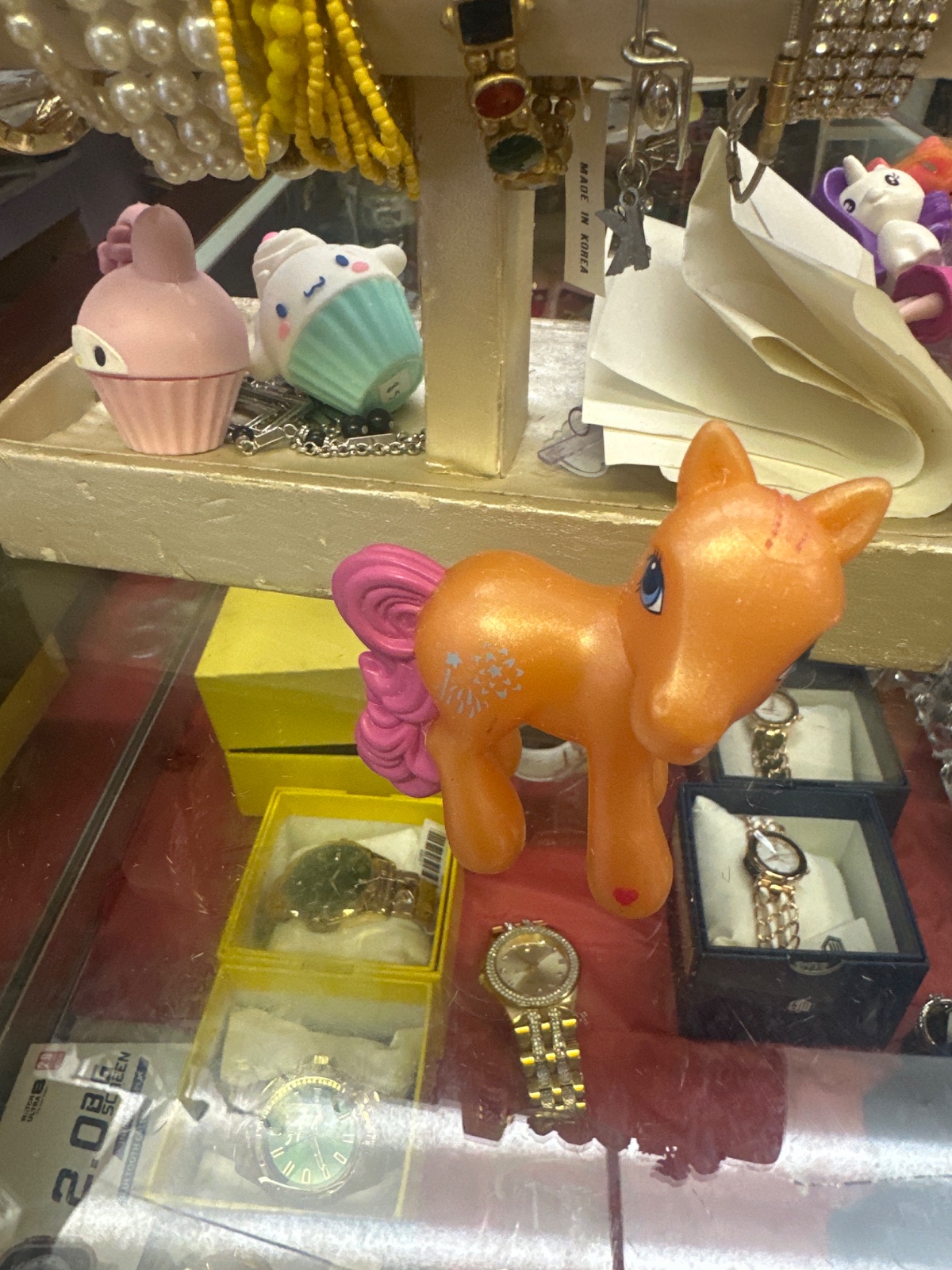 Orange My Little Pony Figure With Pink Curled Tail