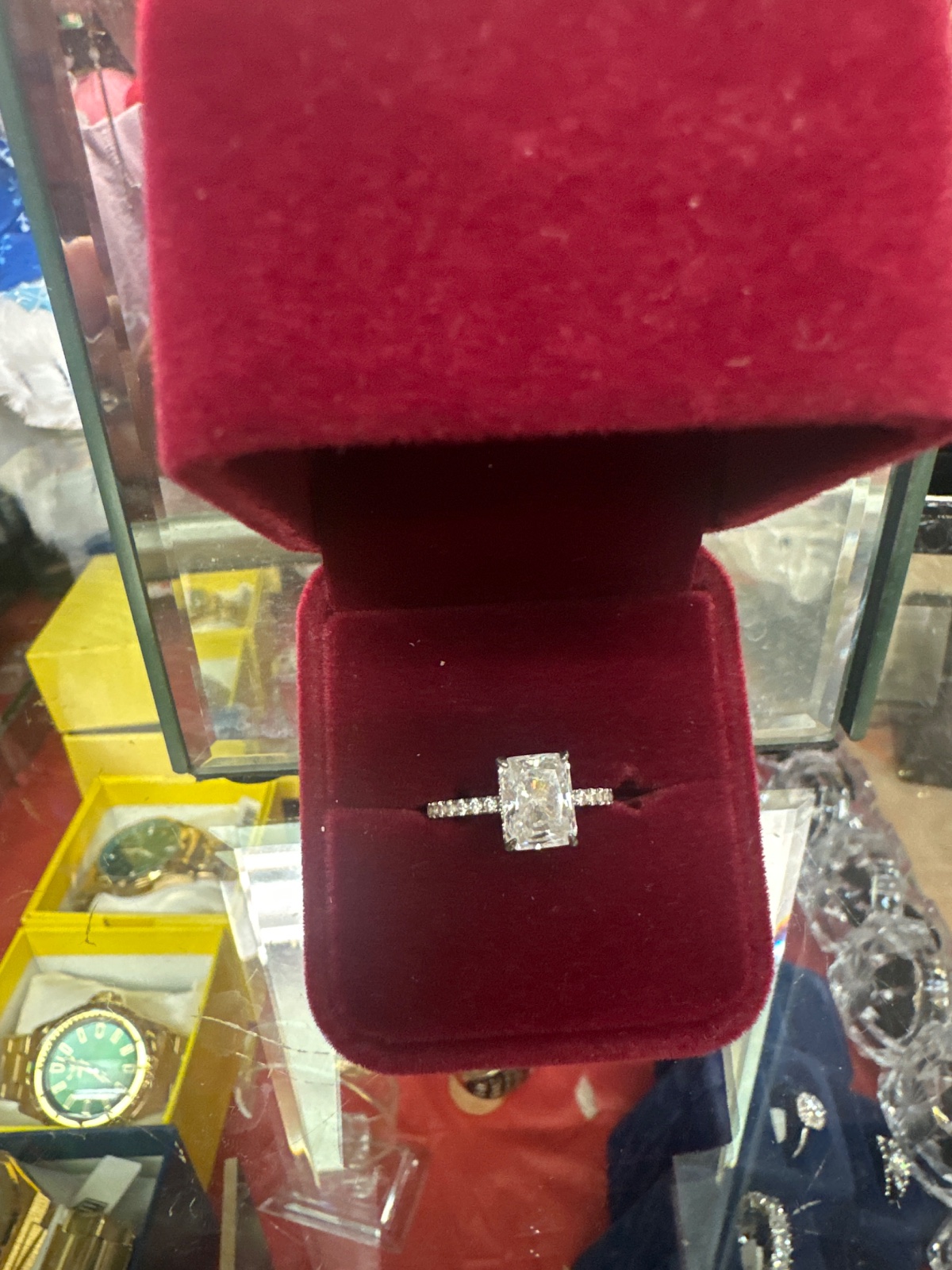 Emerald-Cut Solitaire Ring with Pavé Band