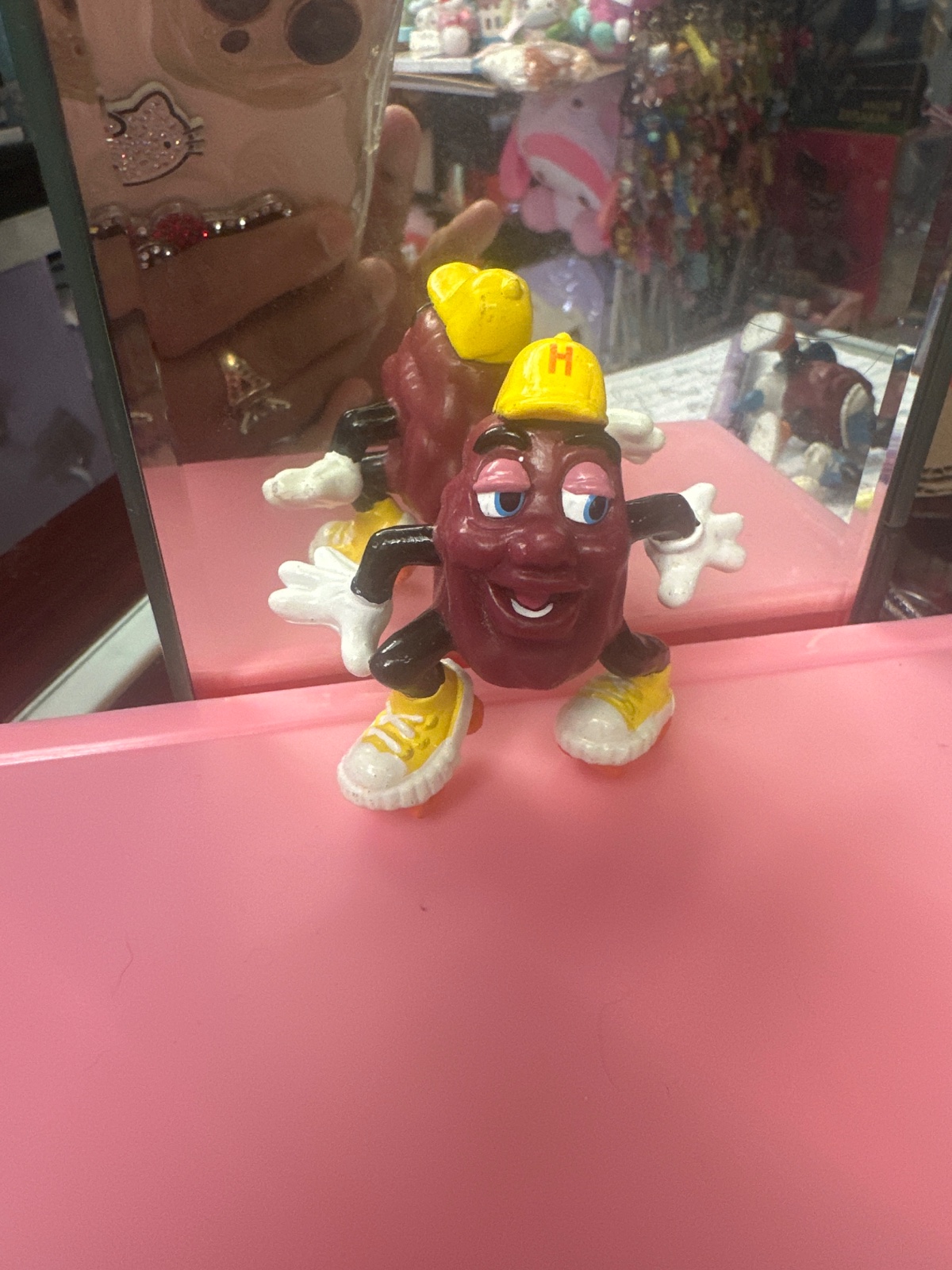 California Raisin Figure in Roller Skates with Hard Hat