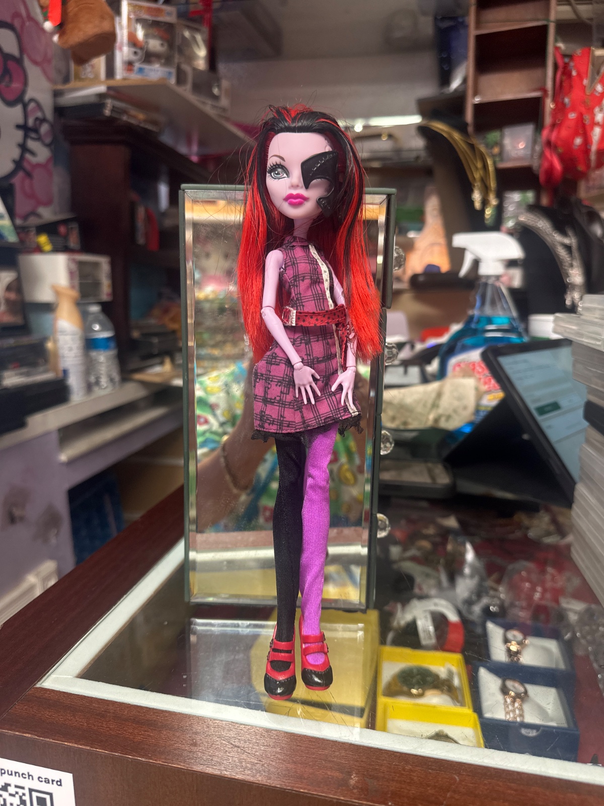 Red-Haired Monster High Doll with Eyepatch and Plaid Dress