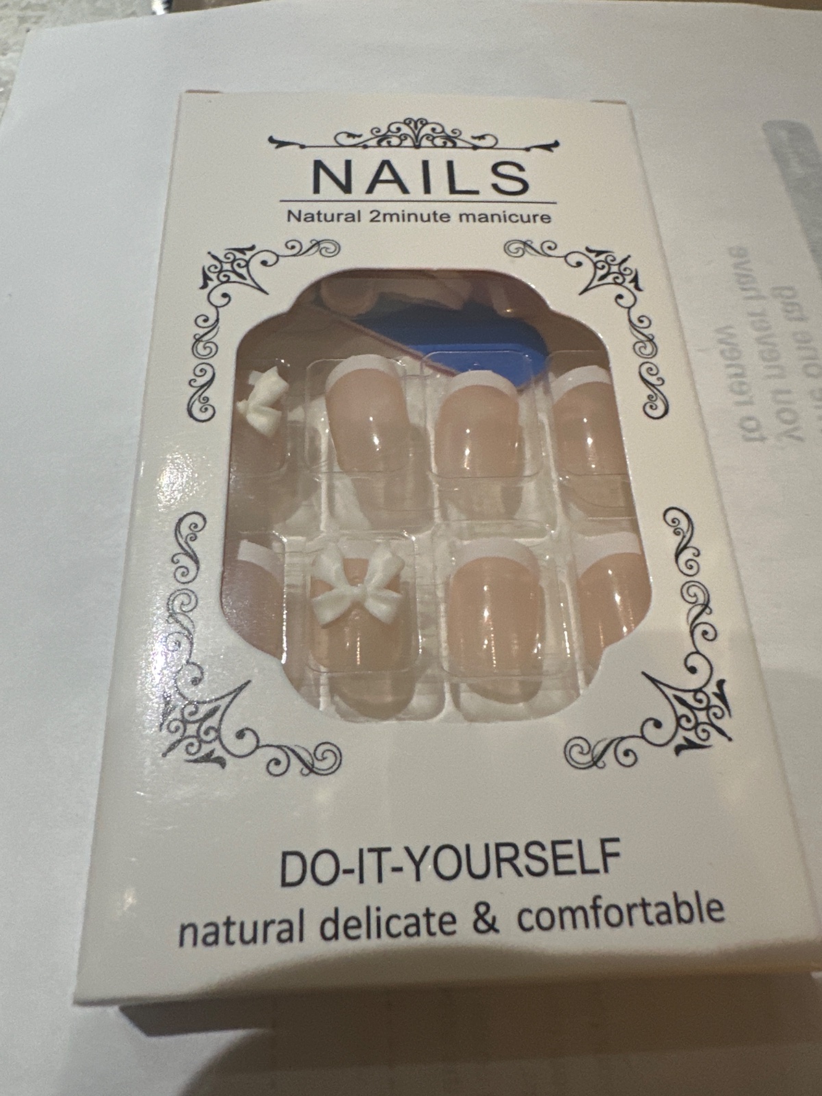 French Tip Press-On Nails With Bow Detail