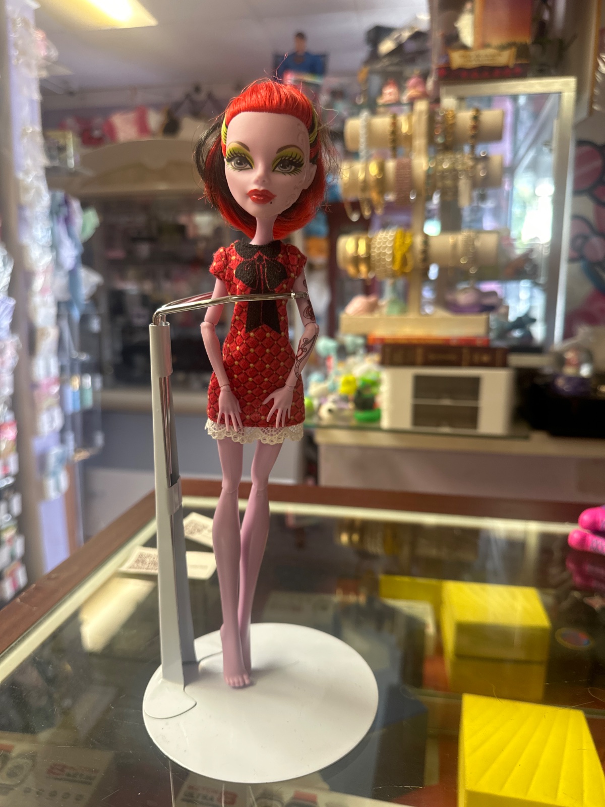 Red-Haired Monster High Doll in Patterned Dress