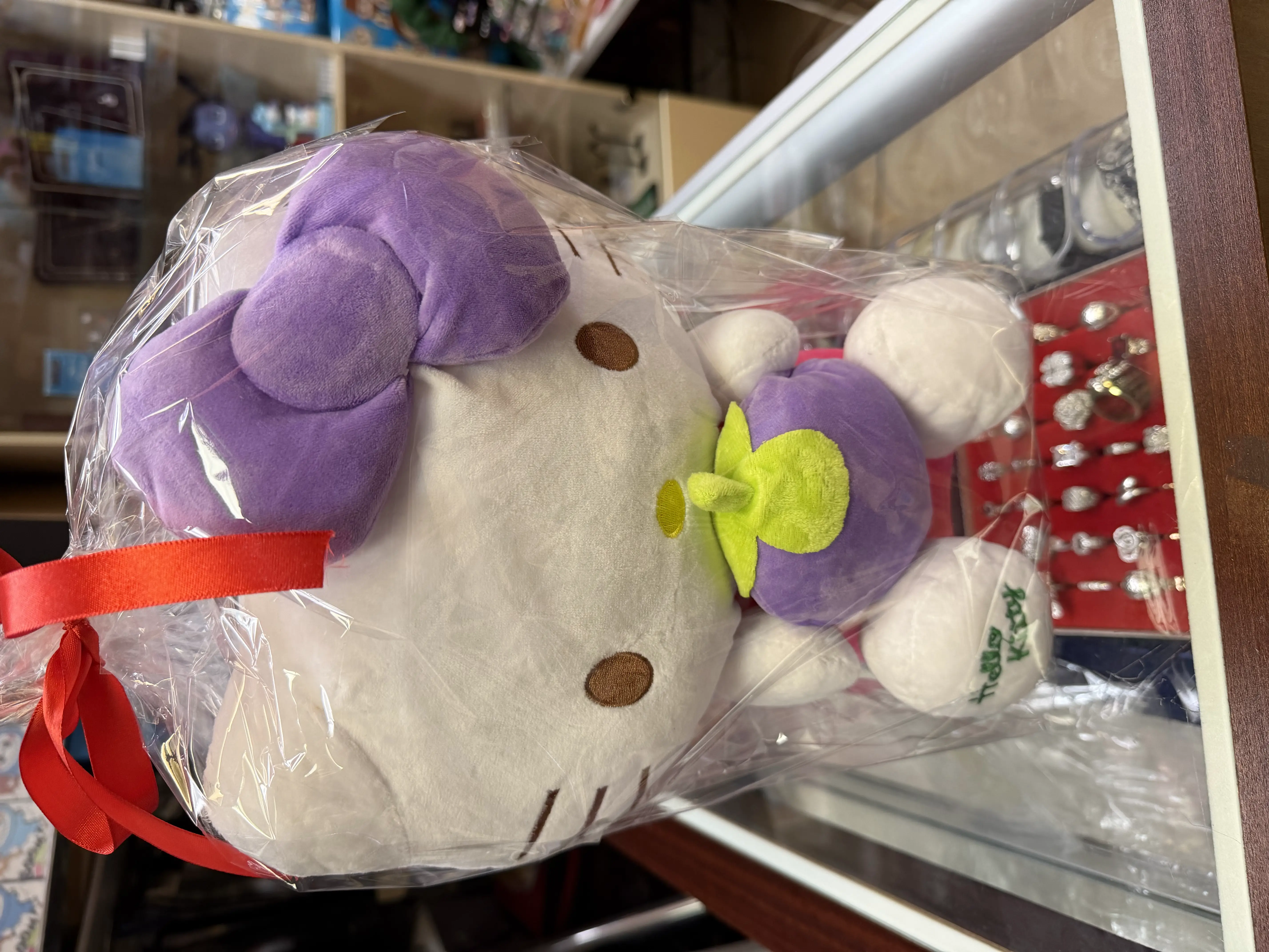 Rare Hello Kitty purple bow and plum jumbo plush