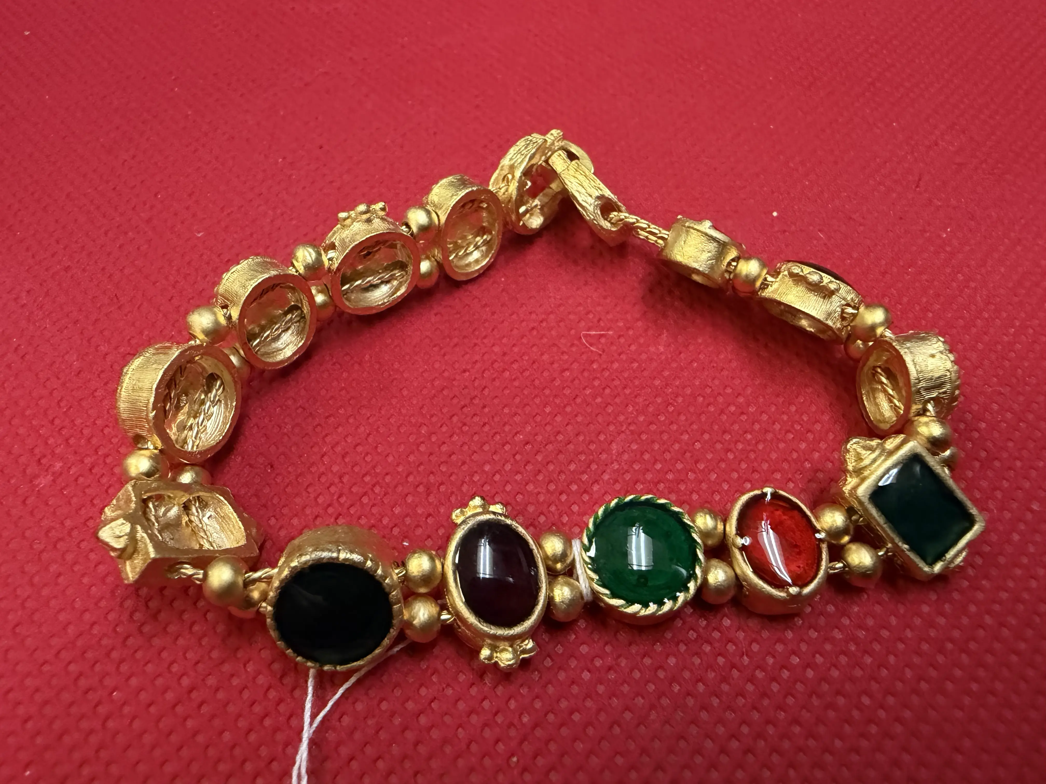 Golden Bracelet with different colored stones